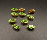 Vintage Czech Glass Faceted Navettes in gold sew on setting 8x4mm Peridot