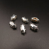Swarovski 4228 Navette in silver plated sew on setting 10x5mm Comet Argent