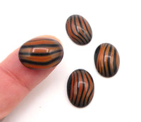 West German Glass Dome Moonglow Oval Cabochons 18x13mm Black & Orange Coral Stripes