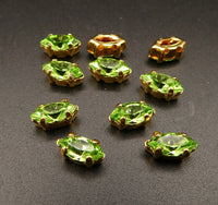 Vintage Czech Glass Faceted Navettes in gold sew on setting 8x4mm Peridot