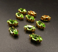 Vintage Czech Glass Faceted Navettes in gold sew on setting 8x4mm Peridot