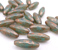 Czech Glass Peeled Olive Beads 19x7mm Turquoise Opal with Copper Wash Uranium