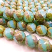 Czech Faceted Spiral Cut 12mm Opaline Blue Uranium Glow with Travertine