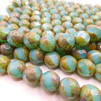 Czech Faceted Spiral Cut 12mm Opaline Blue Uranium Glow with Travertine