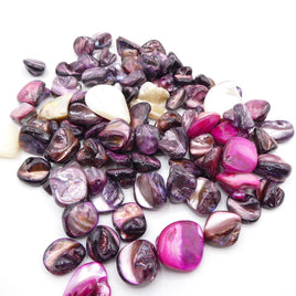 Dyed pink mother of pearl beads. Irregular shapes