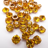 Swarovski 1088 Chaton in setting 34ss (7mm) Topaz