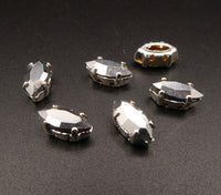 Swarovski 4228 Navette in silver plated sew on setting 10x5mm Comet Argent