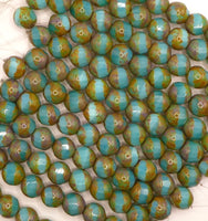 Czech Faceted Spiral Cut 12mm Opaline Blue Uranium Glow with Travertine