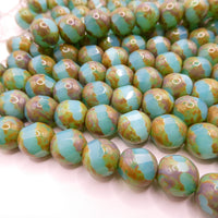 Czech Faceted Spiral Cut 12mm Opaline Blue Uranium Glow with Travertine