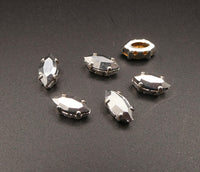 Swarovski 4228 Navette in silver plated sew on setting 10x5mm Comet Argent