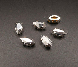Swarovski 4228 Navette in silver plated sew on setting 10x5mm Comet Argent