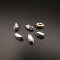 Swarovski 4228 Navette in silver plated sew on setting 10x5mm Comet Argent