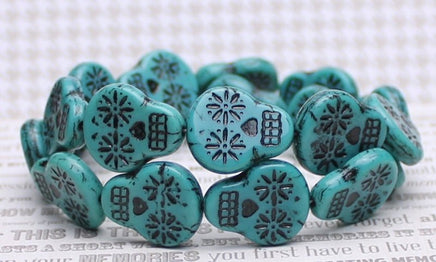 Czech Glass Sugar Skull Beads 20x17mm Turquoise Opaque with Black Wash - Bead Nerd