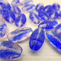 German Glass Criscross Beads 16 x 8mm Sapphire and Rosaline - Bead Nerd