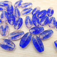 German Glass Criscross Beads 16 x 8mm Sapphire and Rosaline - Bead Nerd