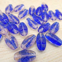 German Glass Criscross Beads 16 x 8mm Sapphire and Rosaline - Bead Nerd