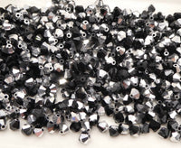 Preciosa Crystal Bicone 5mm Labrador Half Jet - Bead Nerd