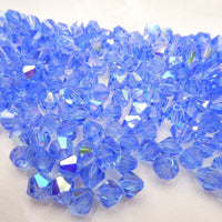 Preciosa Crystal Bicone 6mm Light Sapphire AB - Bead Nerd