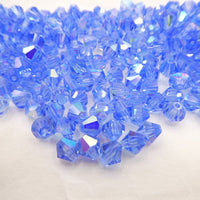 Preciosa Crystal Bicone 6mm Light Sapphire AB - Bead Nerd