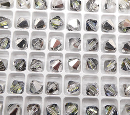 Preciosa Crystal Bicone 8mm Crystal Sahara - Bead Nerd