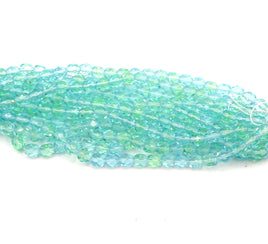 Czech Glass Fire Polish Beads 6mm Two Tone Transparent Uranium Glow Blue & Green 
Quantity: 25 - Bead Nerd