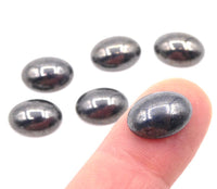 Vintage Czech Dome Glass Oval Cabochon 14x10mm Hematite - Bead Nerd