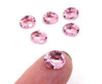 Vintage Swarovski 4100 Oval Crystal Rhinestone 10x8mm Light Rose - Bead Nerd