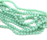 West German Lucite Round Beads 8mm Milky Jade Green 2mm hole - Bead Nerd