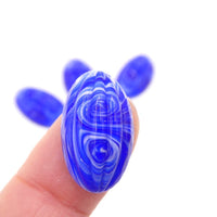 West German Oval Grooved Cabochons 23x14mm Blue White Swirl - Bead Nerd