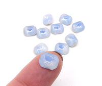 West German Sabrina Glass Octagons 10x8mm Light Sapphire - Bead Nerd